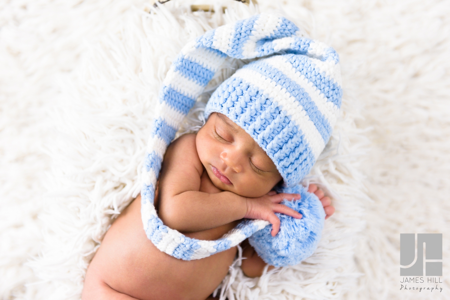 newborn baby in a hat