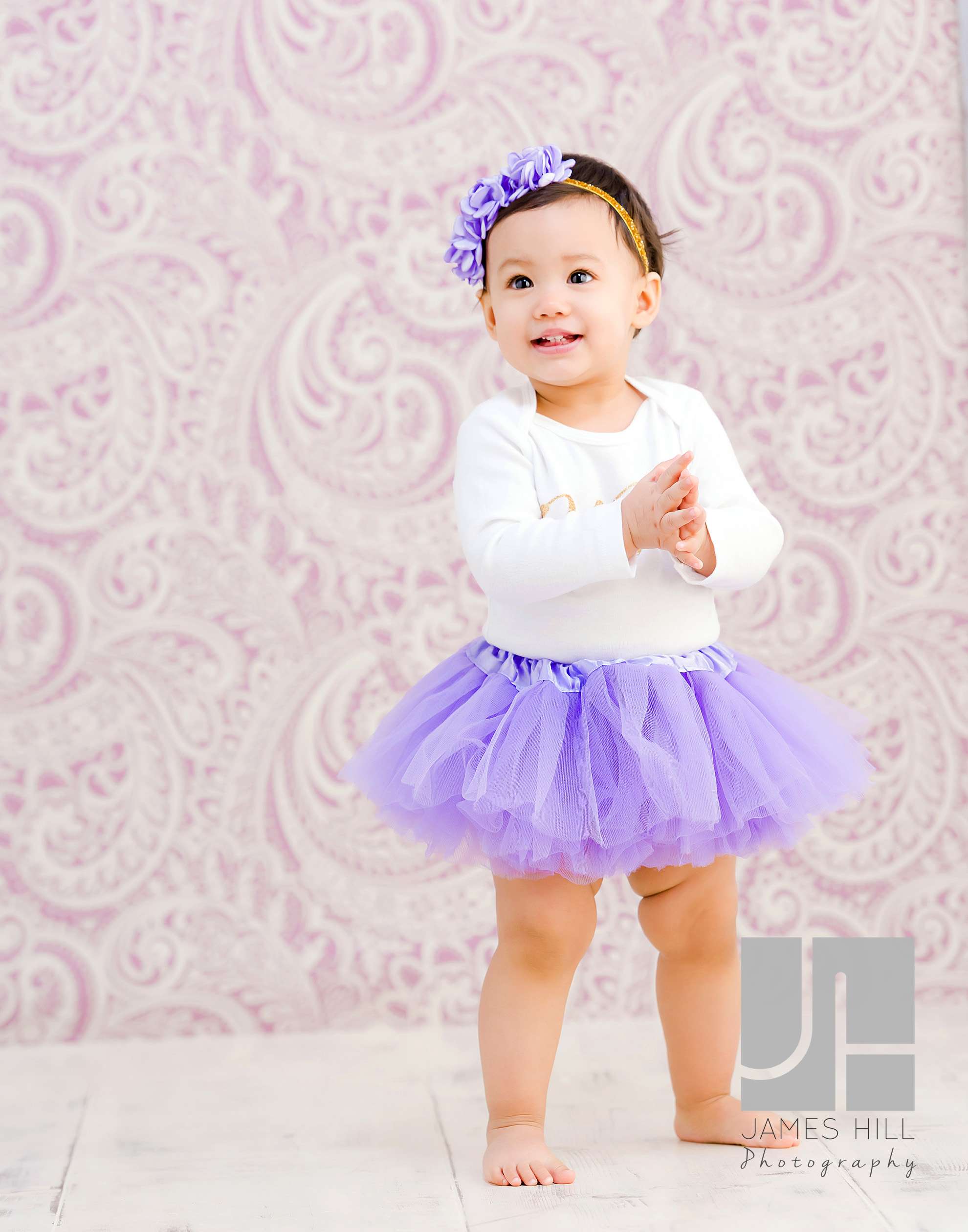 So sweet in her purple tutu!