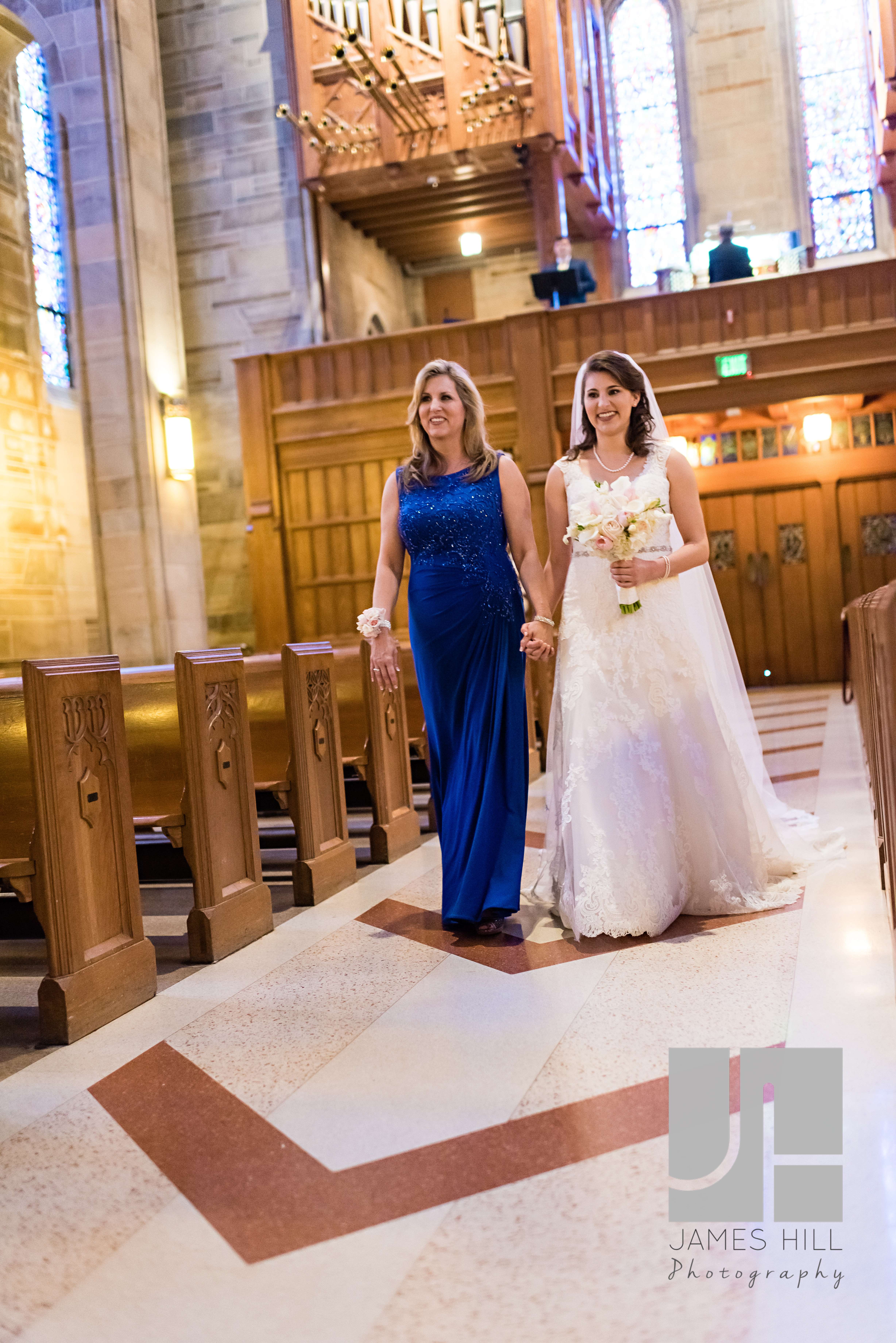 Walking down the aisle at The Cathedral at Christ The King