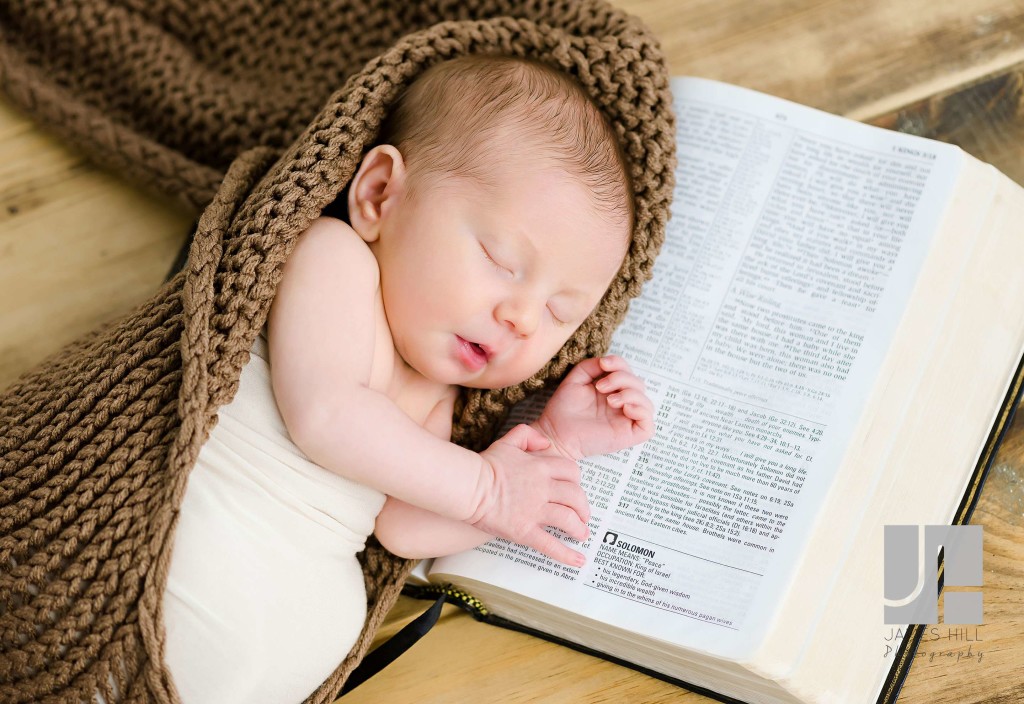 Atlanta Newborn posed with bible