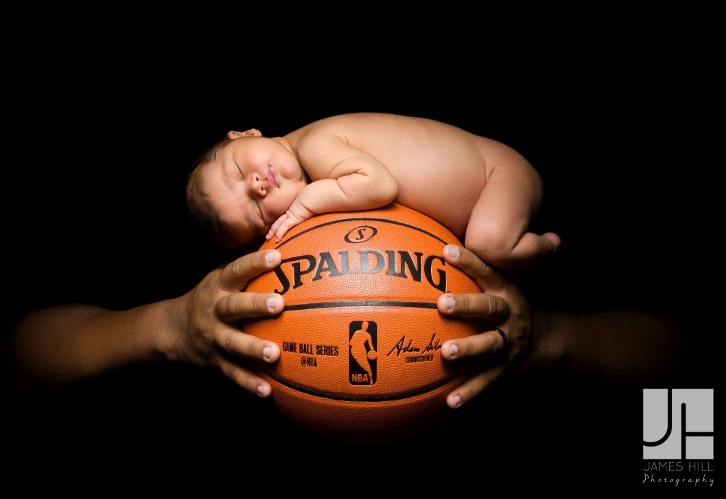 Newborn on basketball