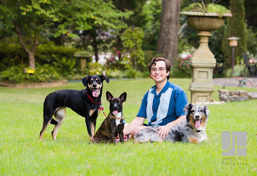Dad poses with pups